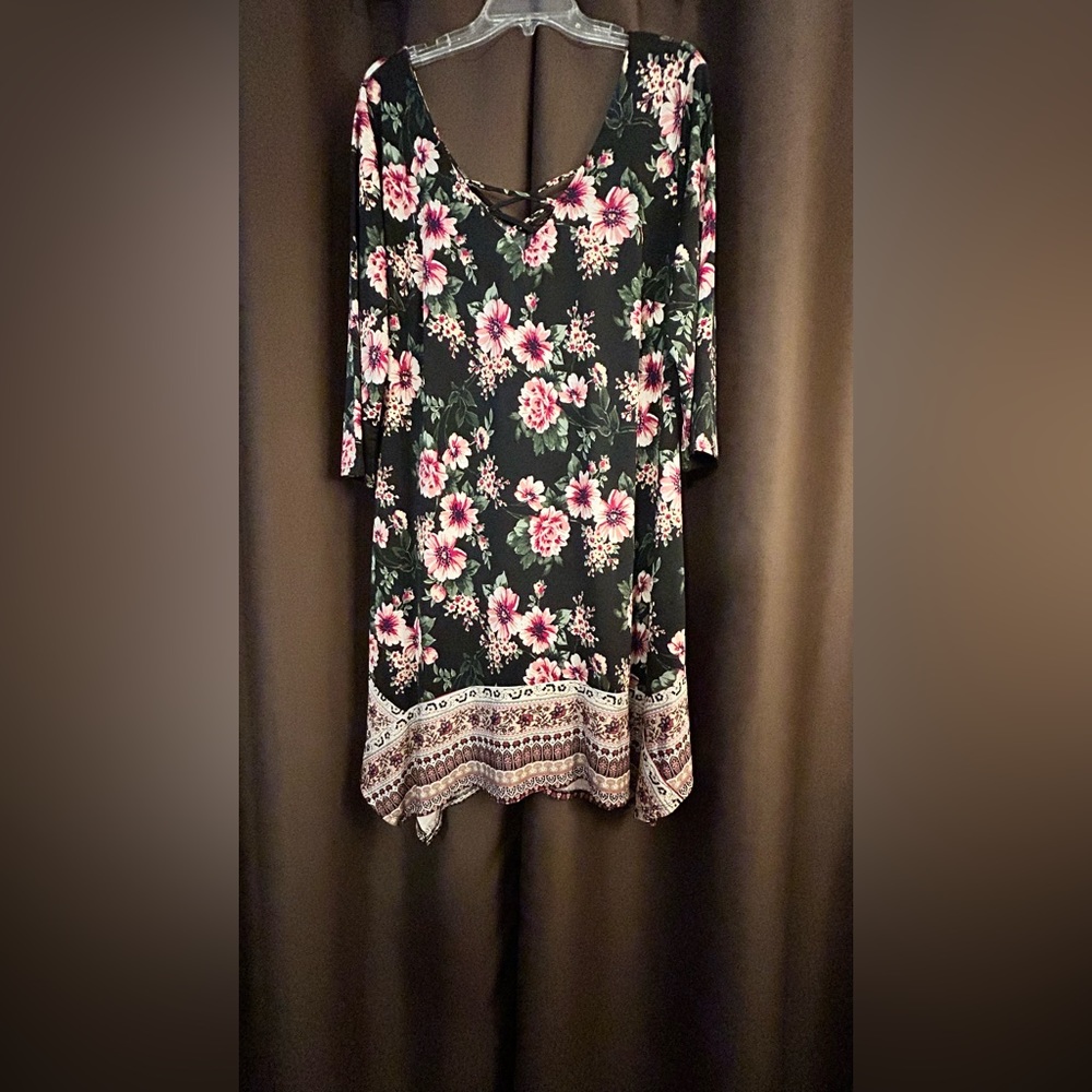 1 X black dress with floral and prints. 3/4 sleeves.Neck has criss cross straps
